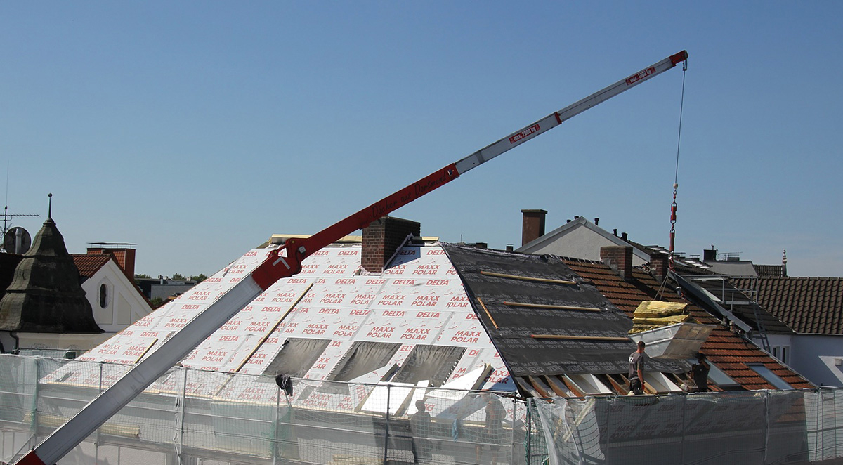 How to Rent a Crane for a School Roofing Project